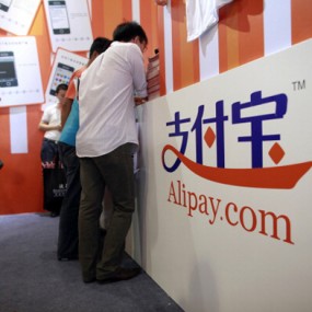 People at an Alipay counter