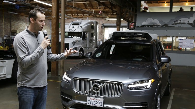 Anthony Levandowski with Uber self-driving car