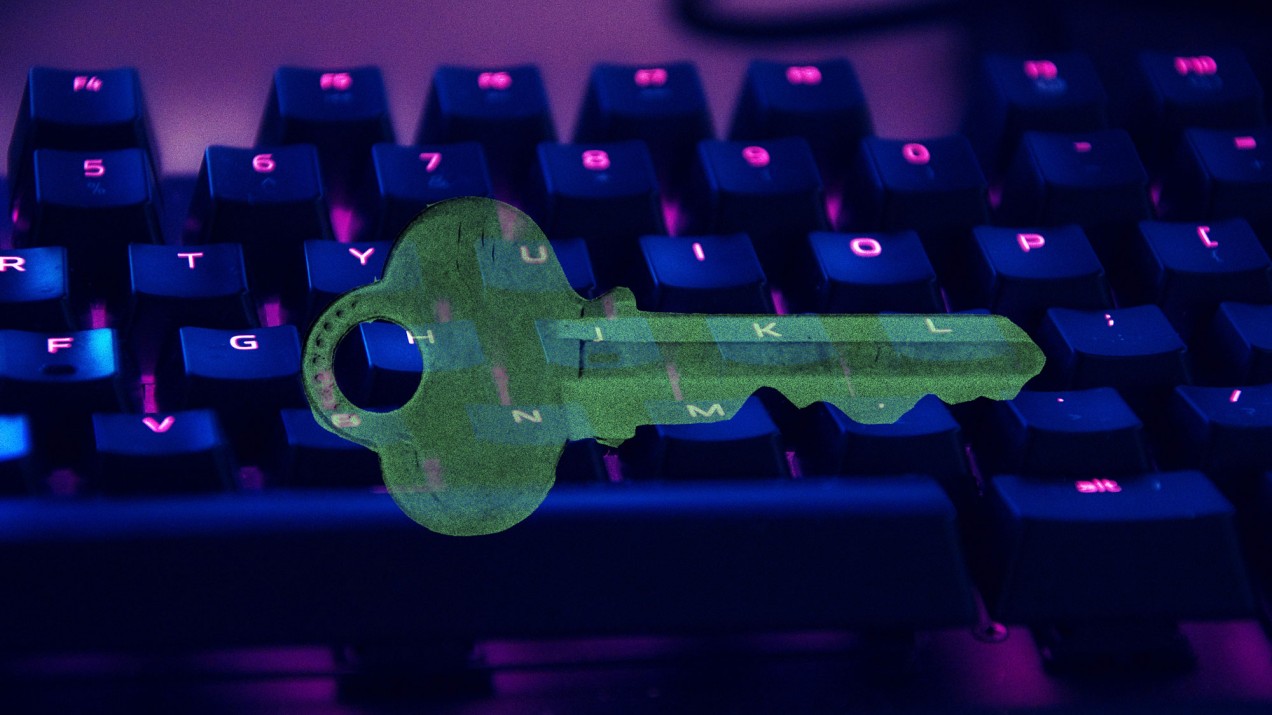 Photo illustration of a computer keyboard and a key