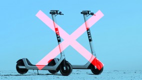An image of bird scooters overlaid with a red X