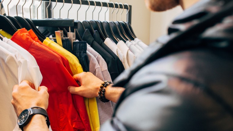 image of man shopping for clothes