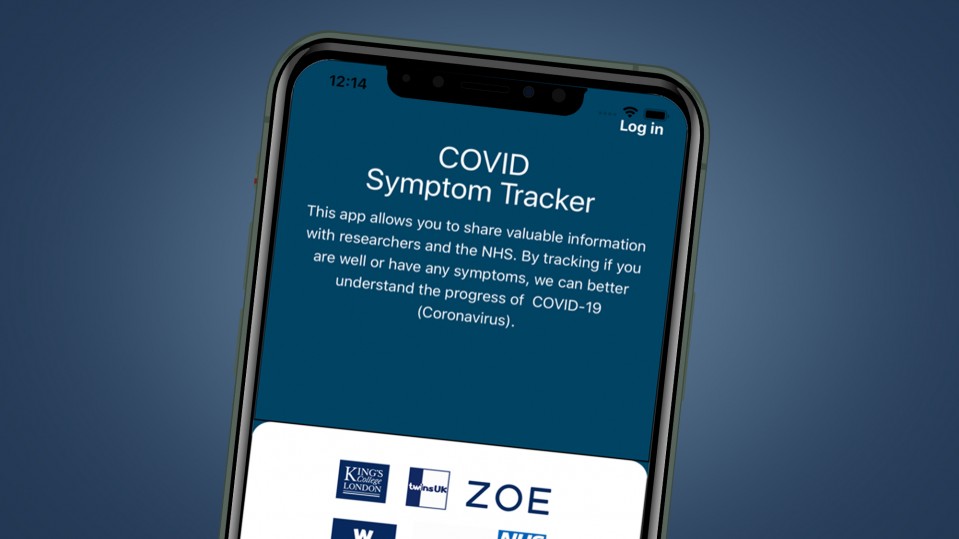 A phone with the Covid Symptom Tracker app open