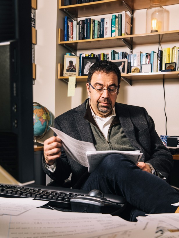Daron Acemoglu at his desk