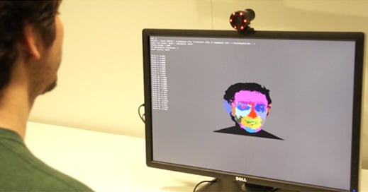 computer with Microsoft image of person's face