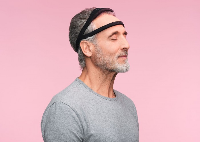 Photograph of a man wearing the dream headband