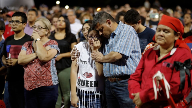 People grieving in El Paso after a mass shooting last weekend