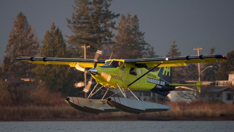 The world's first electric commercial aircraft owned and operated by Harbour Air is seen landing following its maiden flight in Richmond, B.C.