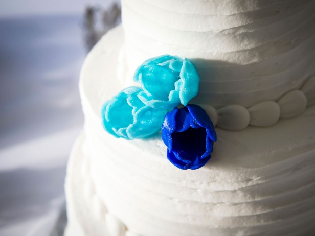 Photo of cake with 3-d printed flowers