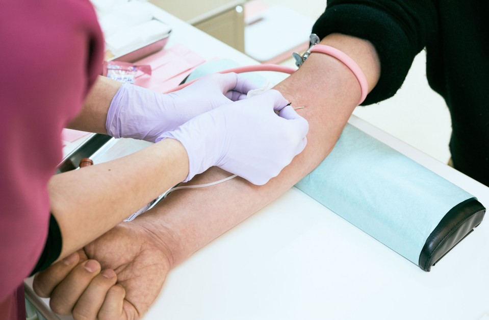 An image of a patient having their blood drawn