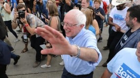 Democratic presidential candidate Sen. Bernie Sanders waves to supporters in Iowa last summer.