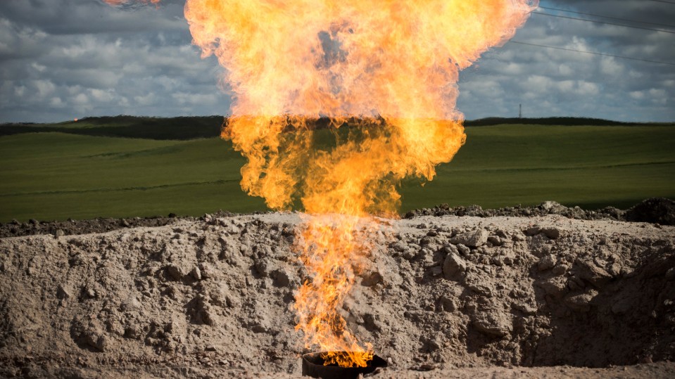 Flaring methane at a fuel extraction site.