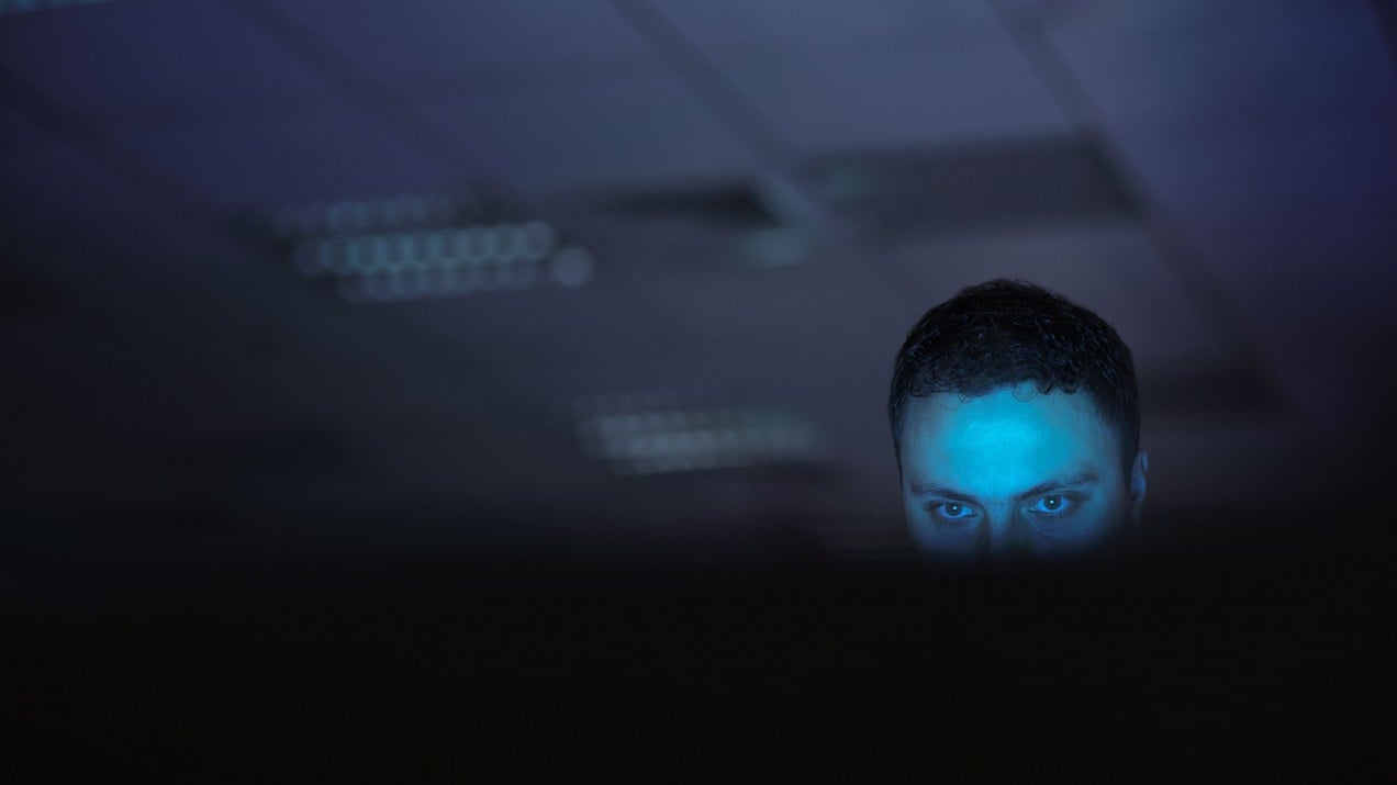 man with blue light on his face searching internet reddit manosphere incel pick up artist mens rights gab toxic