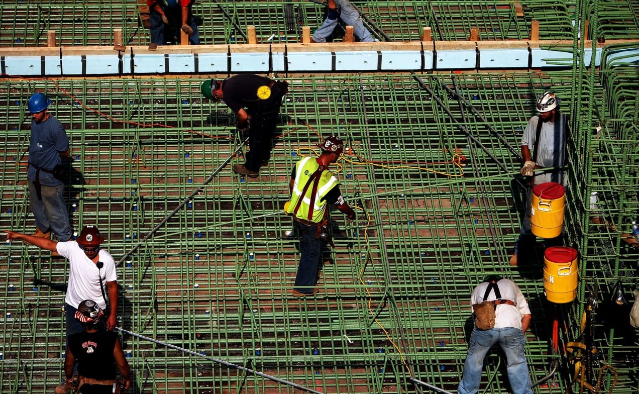 An image of construction workers
