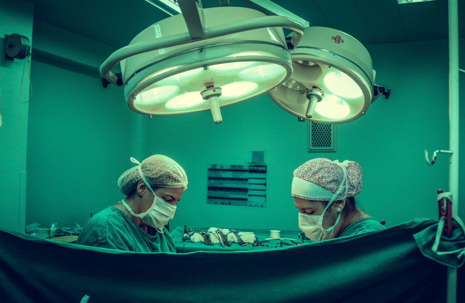 healthcare workers in operating room
