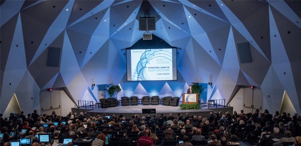 Photo of stage and audience at Human Gene Editing Summit