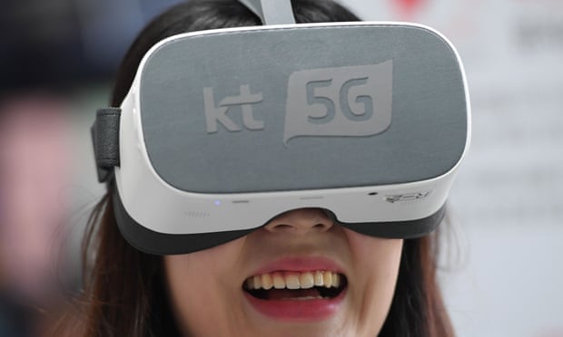 A woman wearing a 5G enabled VR device