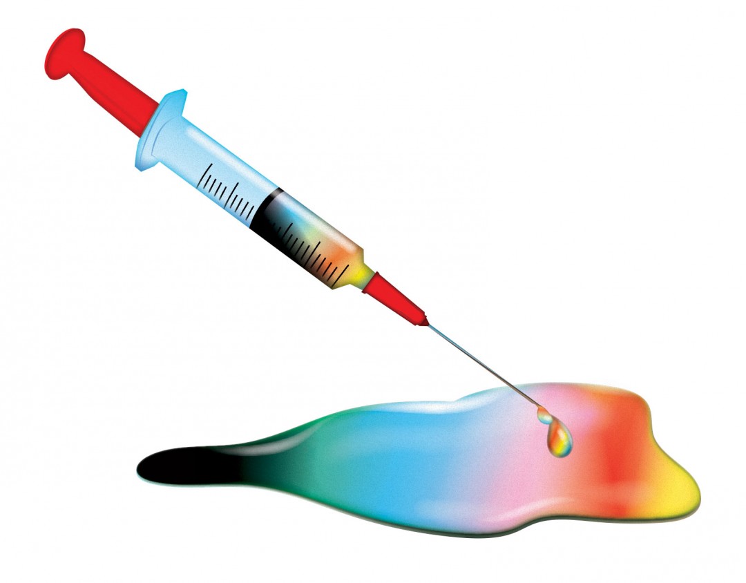 Illustration of a syringe and colorful liquid