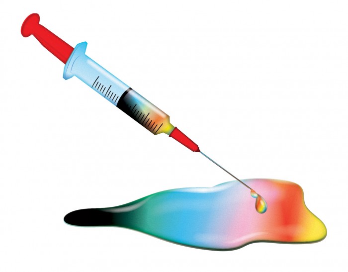 Illustration of a syringe and colorful liquid