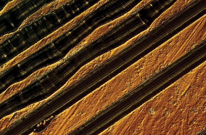 Close-up image of grooves in a vinyl recording