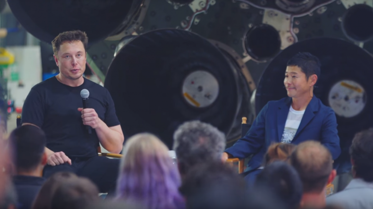 Image of Musk and Maezawa at the announcement of the first moon tourist.