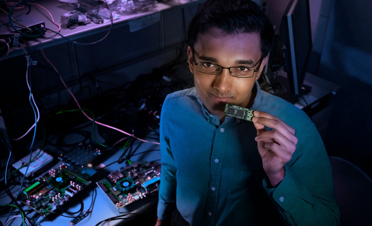 Nabil Imam with Intel's Loihi chip.