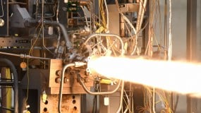 Image of engineers test-firing a 3D-printed rocket engine combustion chamber at NASA’s Marshall Space Flight Center in Huntsville, Alabama.