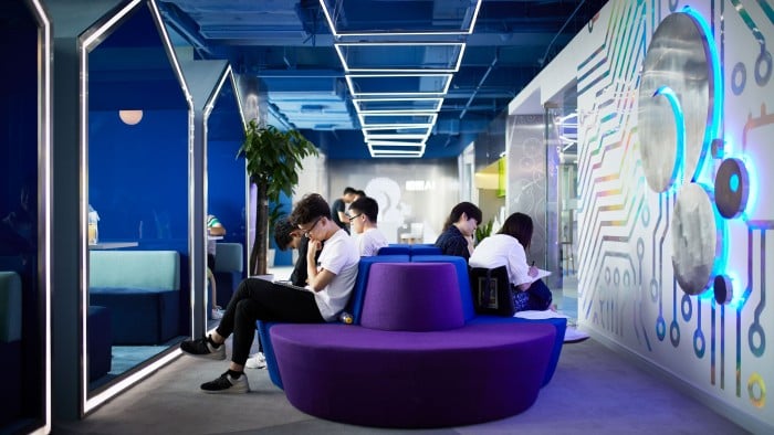 Squirrel AI employees sit around the company's headquarters in Shanghai.