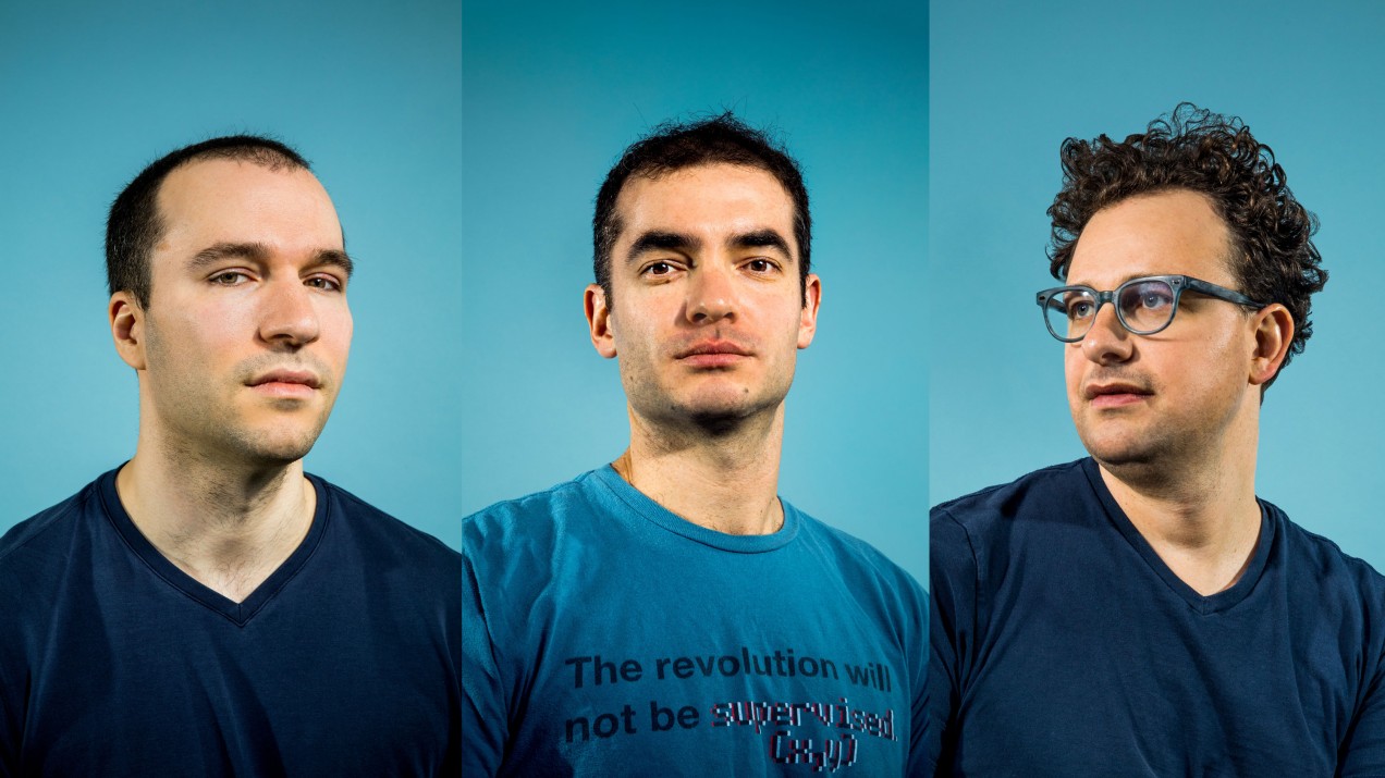 Photograph of three founding members of OpenAI