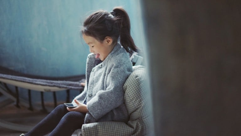 A child using a smartphone