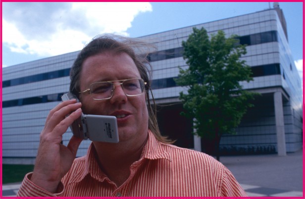 Photo of Christopher Schmandt on cell phone