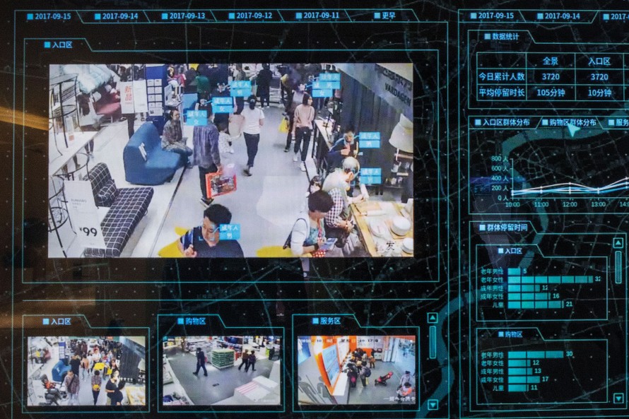 Photo of a facial recognition software applied to video footage of shoppers.
