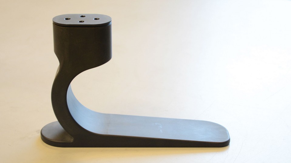 A prototype of a single-part, low-cost prosthetic foot made of nylon.