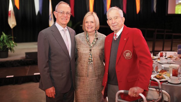 Following the Tech Day program, alumni gather to celebrate class giving. There to represent the 75th-reunion class is Edwin G. Roos ’44 (pictured with President L. Rafael Reif and his wife, Christine).