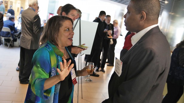 Classmates catch up at the 40th-reunion dinner in the Brain and Cognitive Sciences building. Pictured: Lisa Egbounu-Davis ’79 and Burtel Batson ’79, SM ’80.