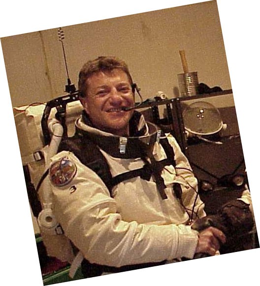 Photo of man in astronaut suit